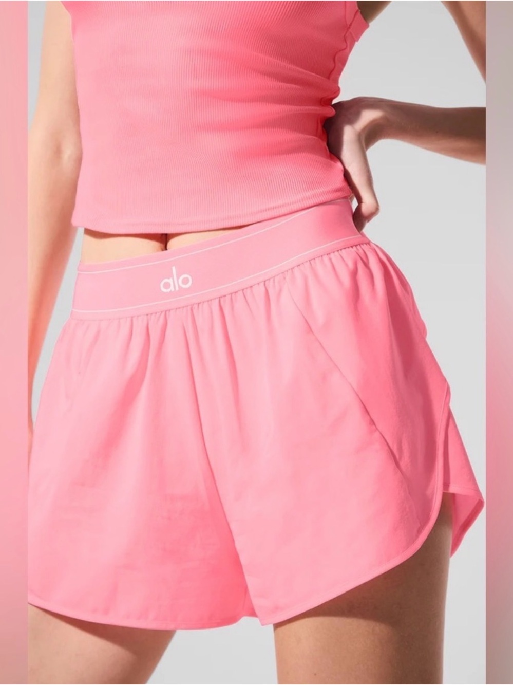 Alo Neon Bubblegum Match Point Shorts